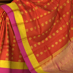 Rustic Orange Kanchipuram Silk Saree with Elegant Bhuttas & Pink Accents - Warm Radiance