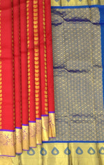 Vibrant Orange Kanchipuram Silk Saree with Gandaberunda & Bhutta Motifs - Mythical Grandeur