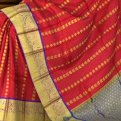 Vibrant Orange Kanchipuram Silk Saree with Gandaberunda & Bhutta Motifs - Mythical Grandeur