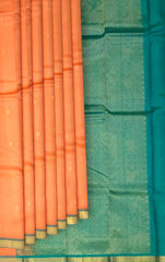Peachish Orange Kanchipuram Silk Saree with Small Bhuttas & Bluish Green Accents - Delicate Charm