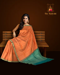 Peachish Orange Kanchipuram Silk Saree with Small Bhuttas & Bluish Green Accents - Delicate Charm