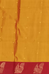 Orangish Yellow Kanchipuram Silk Saree with Annam Border & Small Bhuttas - Auspicious Charm