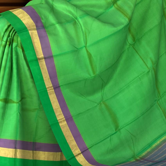 Light Green Kanchipuram Silk Saree with Lilac Contrast Border