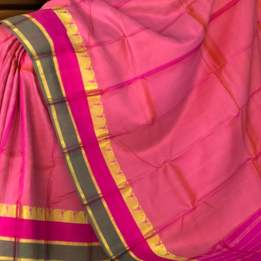 Peach Kanchipuram Silk Saree with Pink and Green Border