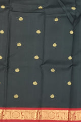 Black Kanchipuram Silk Saree with Red Border and Tear-Shaped Buttas