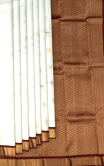 White Kanchipuram Silk Saree with Maroon Border and Floral Buttas