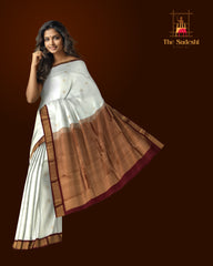 White Kanchipuram Silk Saree with Maroon Border and Floral Buttas