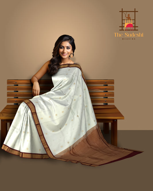 White Kanchipuram Silk Saree with Maroon Border and Floral Buttas