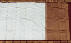 White Kanchipuram Silk Saree with Maroon Border and Floral Buttas