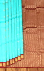 Sky Blue Kanchipuram Silk Saree with Maroon Border and Small Floral Buttas