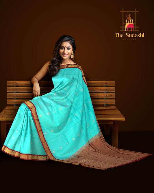 Sky Blue Kanchipuram Silk Saree with Maroon Border and Small Floral Buttas