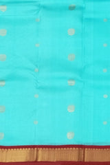 Sky Blue Kanchipuram Silk Saree with Maroon Border and Small Floral Buttas