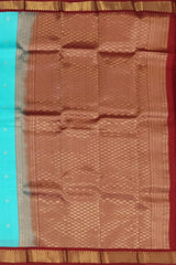 Sky Blue Kanchipuram Silk Saree with Maroon Border and Small Floral Buttas