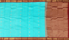 Sky Blue Kanchipuram Silk Saree with Maroon Border and Small Floral Buttas