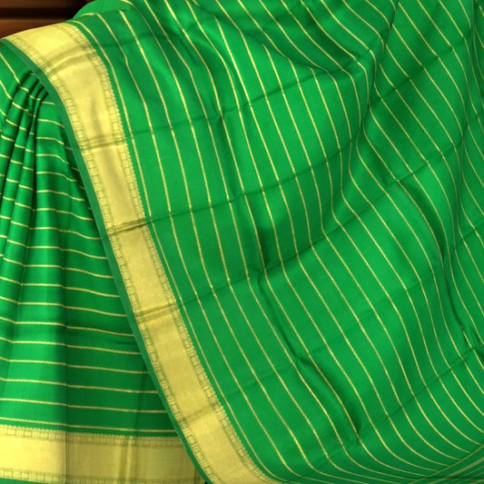 Green Kanchipuram Silk Saree with Self Border and Horizontal Veldhari Pattern