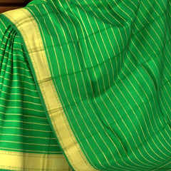 Green Kanchipuram Silk Saree with Self Border and Horizontal Veldhari Pattern