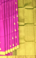 Magenta Kanchipuram Silk Saree with Sap Green Border and Tear-Shaped Buttas