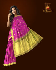 Magenta Kanchipuram Silk Saree with Sap Green Border and Tear-Shaped Buttas