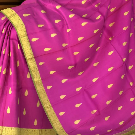 Magenta Kanchipuram Silk Saree with Sap Green Border and Tear-Shaped Buttas