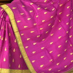 Magenta Kanchipuram Silk Saree with Sap Green Border and Tear-Shaped Buttas