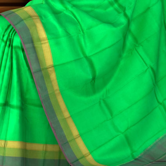 Light Green Kanchipuram Silk Saree with Pink and Green Dual-Tone Border