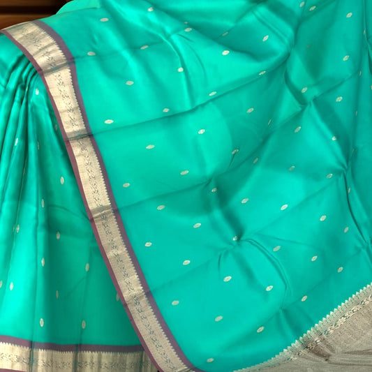 Sea Green Kanchipuram Silk Saree with Dull Maroon Border and Small Buttas