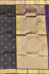 Black Kanchipuram Silk Saree with Purple Border and Small Buttas
