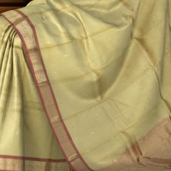 Half White Kanchipuram Silk Saree with Rust Orange Border and Small Buttas