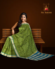 Powder Blue Kanchipuram Silk Saree with Coral Pink Border and Floral Zari Motifs