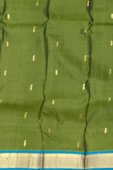 Powder Blue Kanchipuram Silk Saree with Coral Pink Border and Floral Zari Motifs