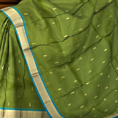 Powder Blue Kanchipuram Silk Saree with Coral Pink Border and Floral Zari Motifs