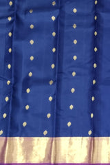 Ivory Kanchipuram Silk Saree with Violet Border and Silver Zari Work