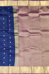 Ivory Kanchipuram Silk Saree with Violet Border and Silver Zari Work