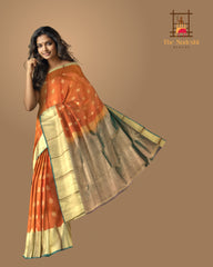 Rust Orange Kanchipuram Silk Saree with Dual Tone Gold Zari Border and Buttas
