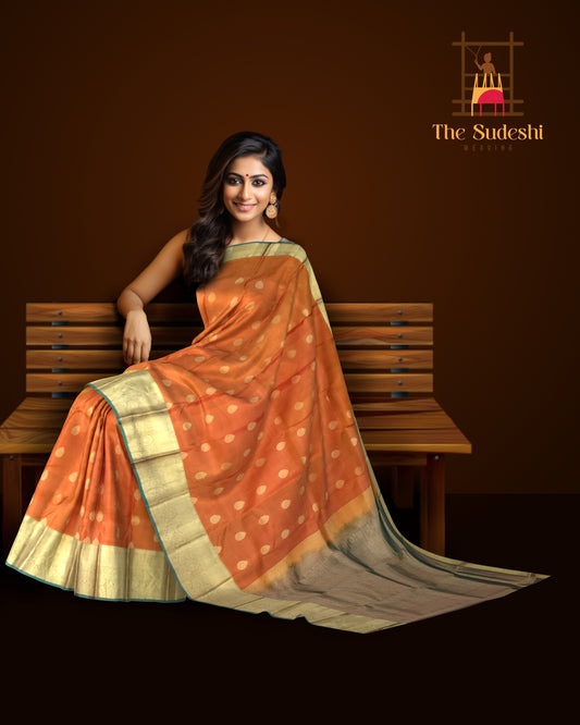 Rust Orange Kanchipuram Silk Saree with Dual Tone Gold Zari Border and Buttas