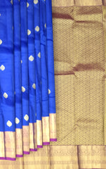 Royal Blue Kanchipuram Silk Saree with Purple Border and Tear-Shaped Buttas