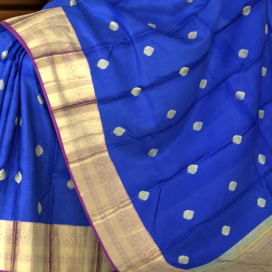 Royal Blue Kanchipuram Silk Saree with Purple Border and Tear-Shaped Buttas