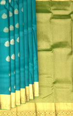 Peacock Green Kanchipuram Silk Saree with Self Green Border and Tear-Shaped Buttas