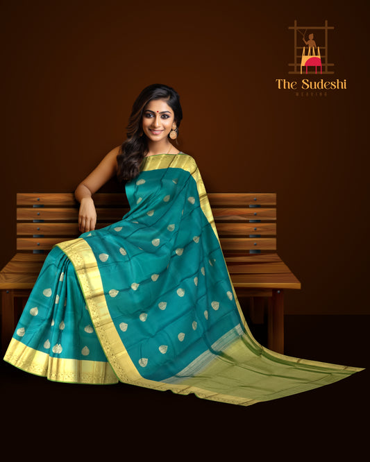 Peacock Green Kanchipuram Silk Saree with Self Green Border and Tear-Shaped Buttas