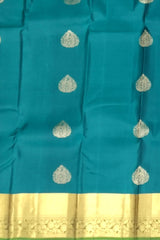 Peacock Green Kanchipuram Silk Saree with Self Green Border and Tear-Shaped Buttas