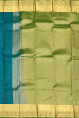 Peacock Green Kanchipuram Silk Saree with Self Green Border and Tear-Shaped Buttas