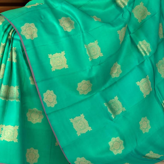 Rama Green Borderless Tomato Pink Pallu Square Butta Kanchipuram Silk Saree