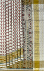 Off White Single Ikat Rajkot Patola Saree with Daliyabhat Butti Design