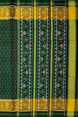 Dark Green Daliyabhat Border Pallu Ghughro (White Design) Single Ikat Rajkot Patola Saree