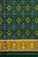 Dark Green Pan Chanda Border Pallu Ghughro (White Design) Single Ikat Rajkot Patola Saree