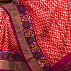Orange Pochampally Ikat Saree with Pink Border and Pallu