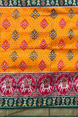 Yellow Pochampally Ikat Saree with Green Border and Pallu