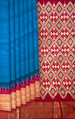 Blue Pochampally Ikat Saree with Pink Border and Pallu