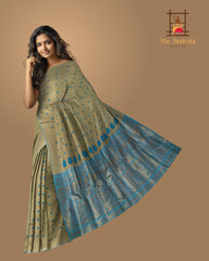 Green Mulberry Silk Saree with Blue Border and Buttis & Motifs