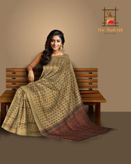 Gold Tassar-Muga Silk Saree with Red Border and Buttis & Motifs
